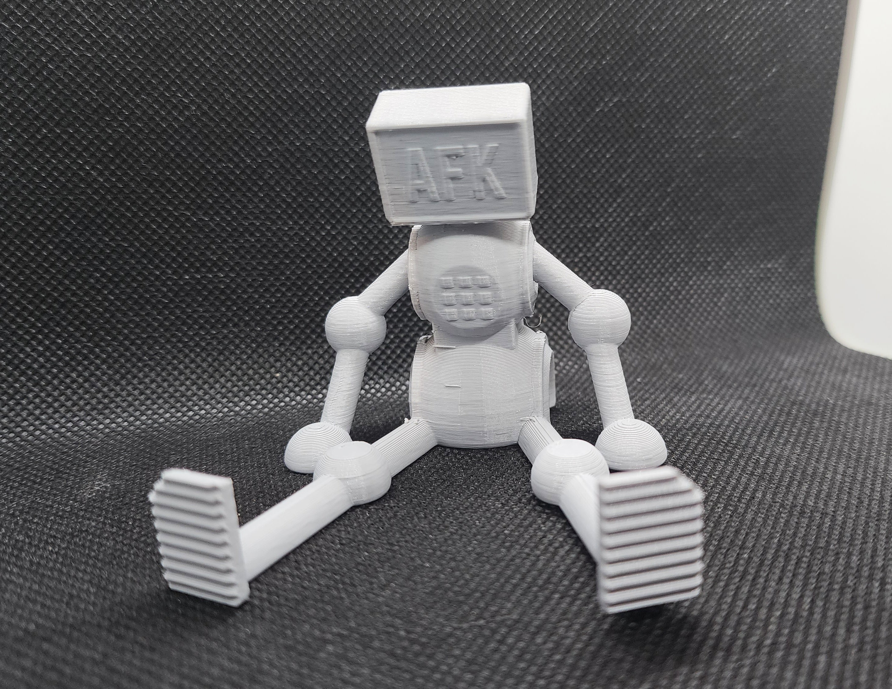Tired Bot Phone & Tablet Stand