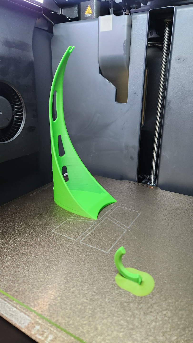 Glasses holder/stand with small storage at bottom.