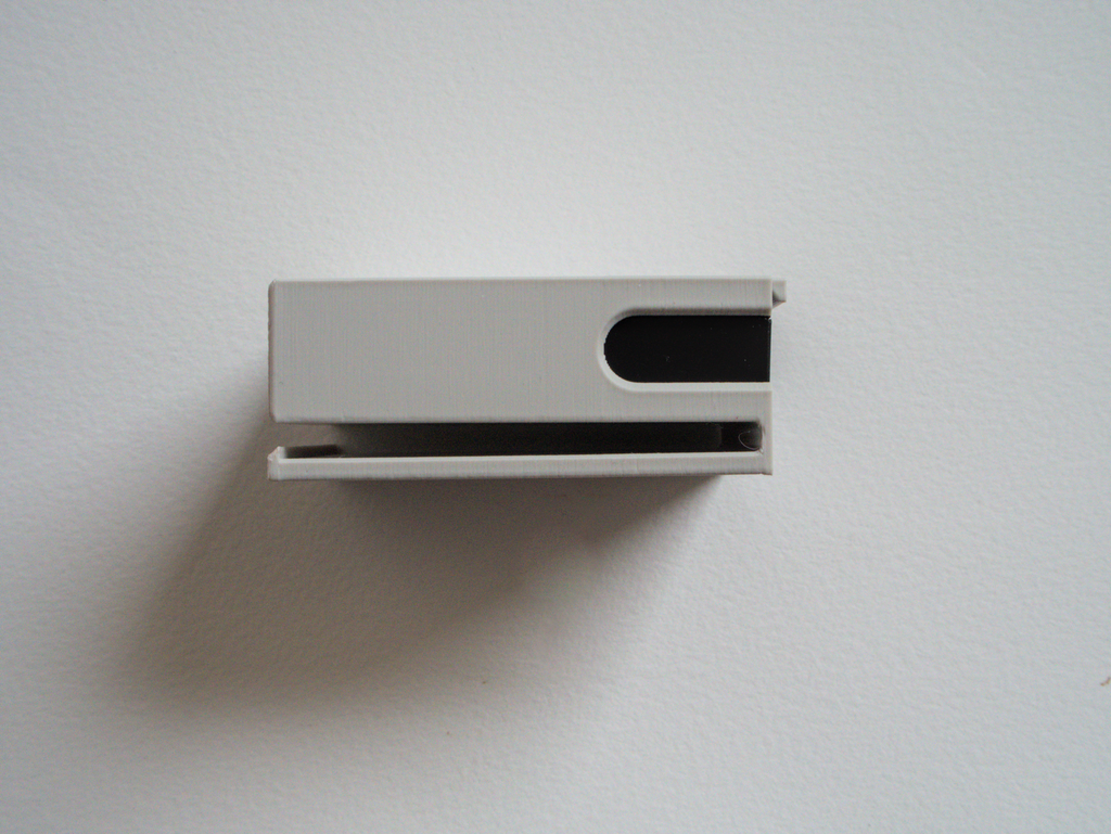 Updated belt clips for Olympus and Canon batteries