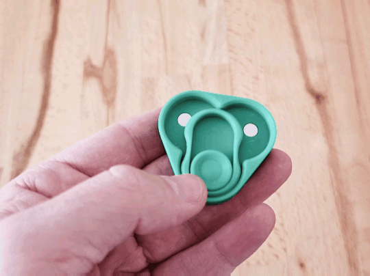 Magnetic sliding fidget