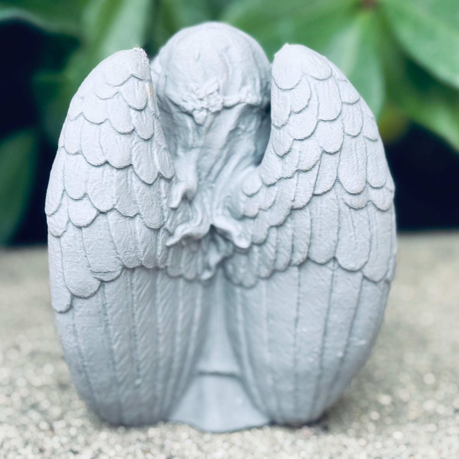 Angel Holding A Basket
