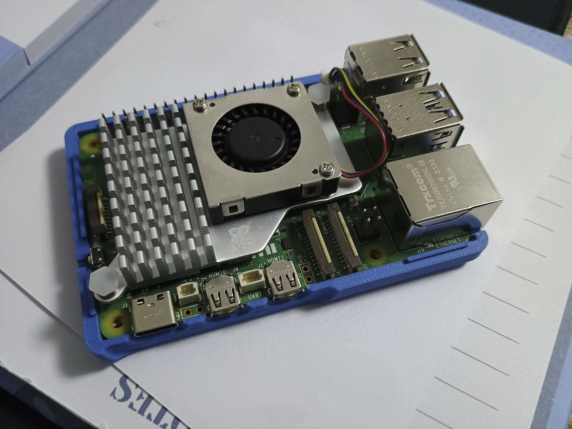 Raspberry Pi 5 case with screws and heat inserts