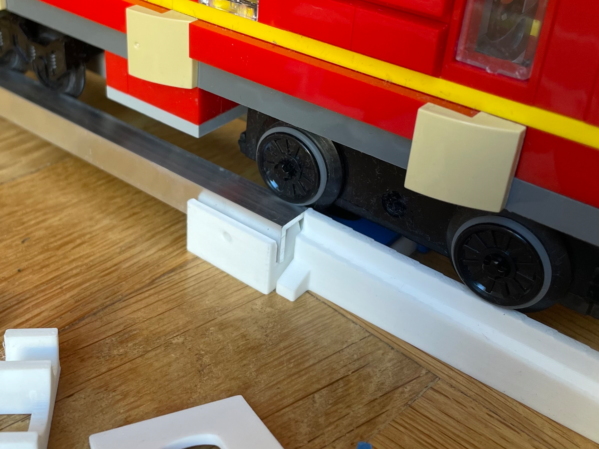 Brick compatible track system