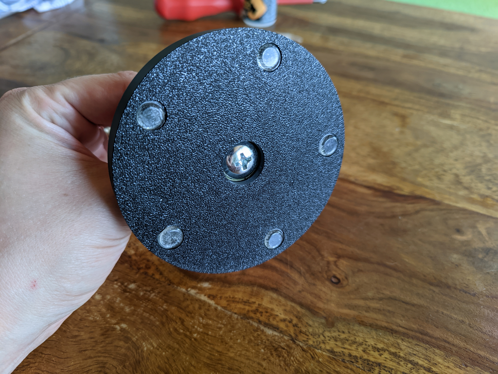 Yarn ball holder with ball bearing knitting gadget