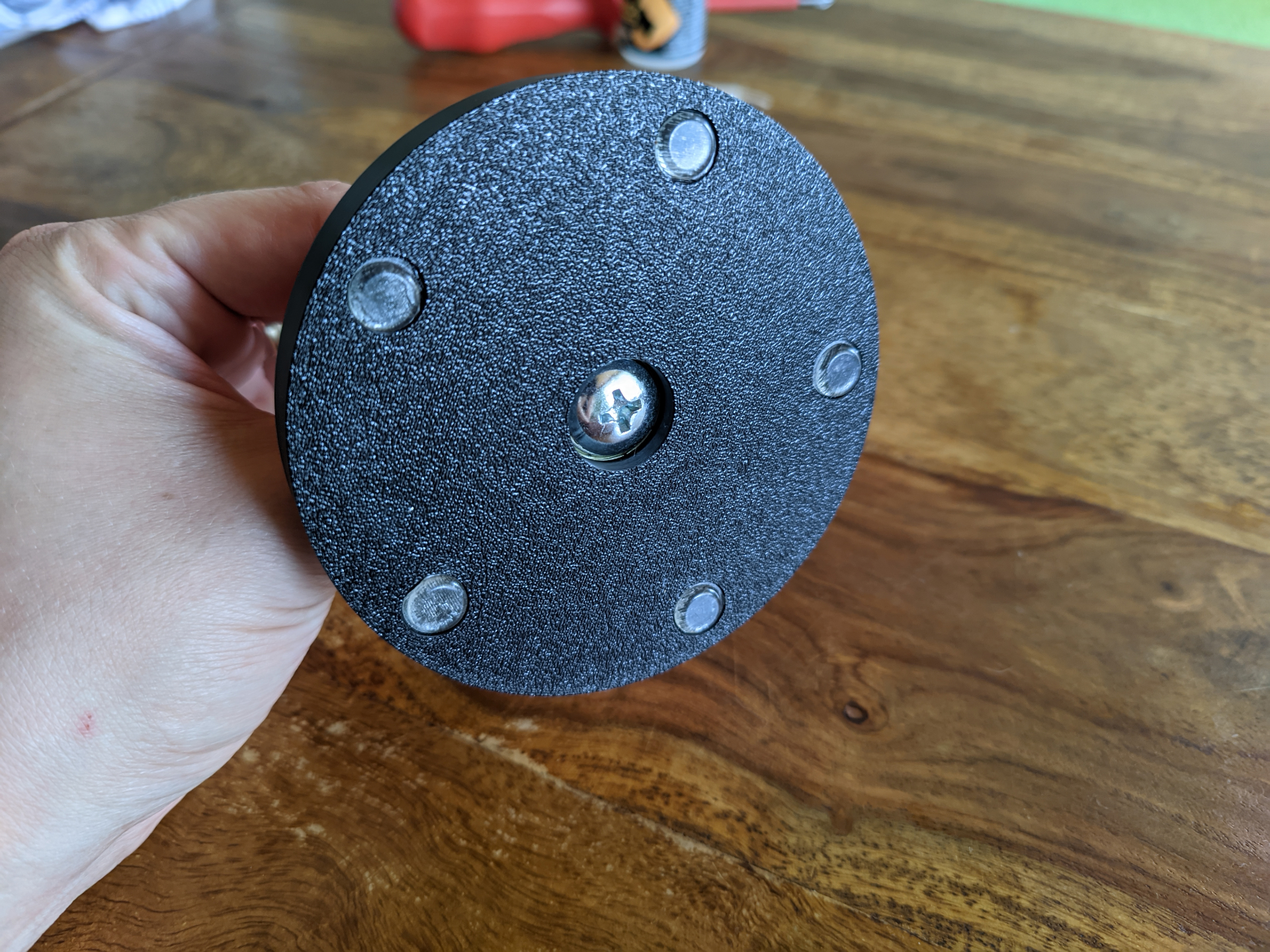 Yarn ball holder with ball bearing knitting gadget