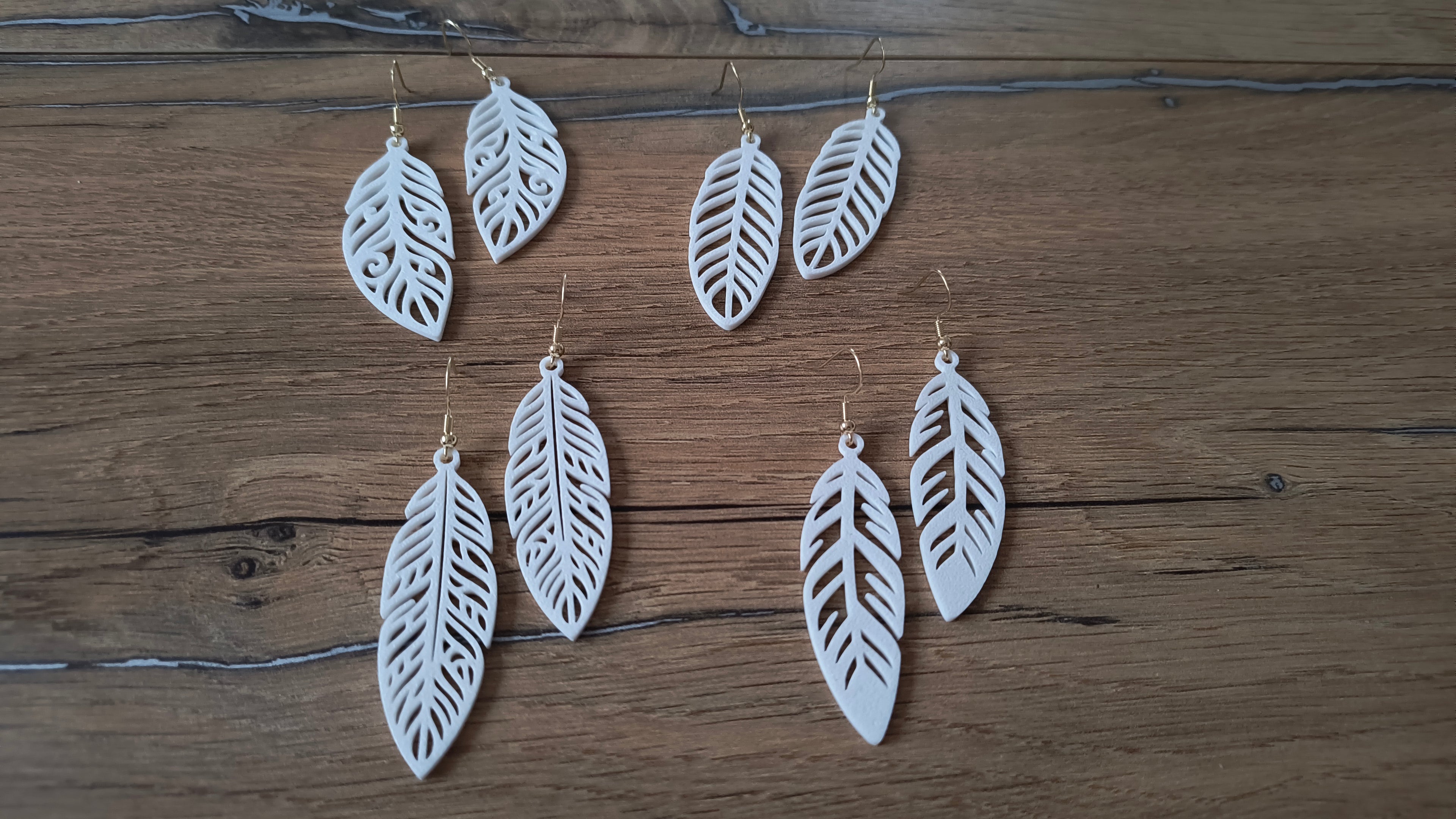 4 different elegant feather earring (free to sell)
